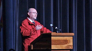 Arkansas SkillsUSA Director Keith McKnight welcomes students and their advisors to the awards ceremony for the spring conference at Horner Hall Wednesday morning. (The Sentinel-Record/James Leigh)